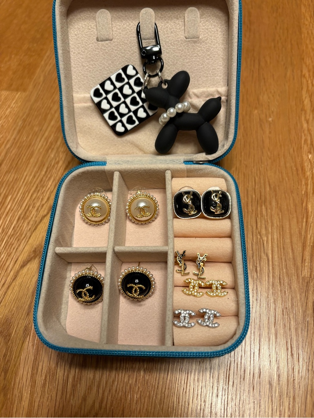 Assortment of Earring, with Black Balloon Dog Keychain, jewelry case included
